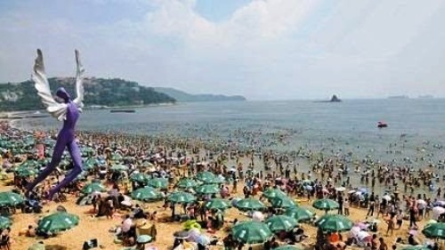 dameisha beach dragon boat festival holiday weekend guangdong people crowds