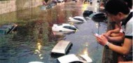 beijing flooding bridge underpass cars rain sewage infrastructure